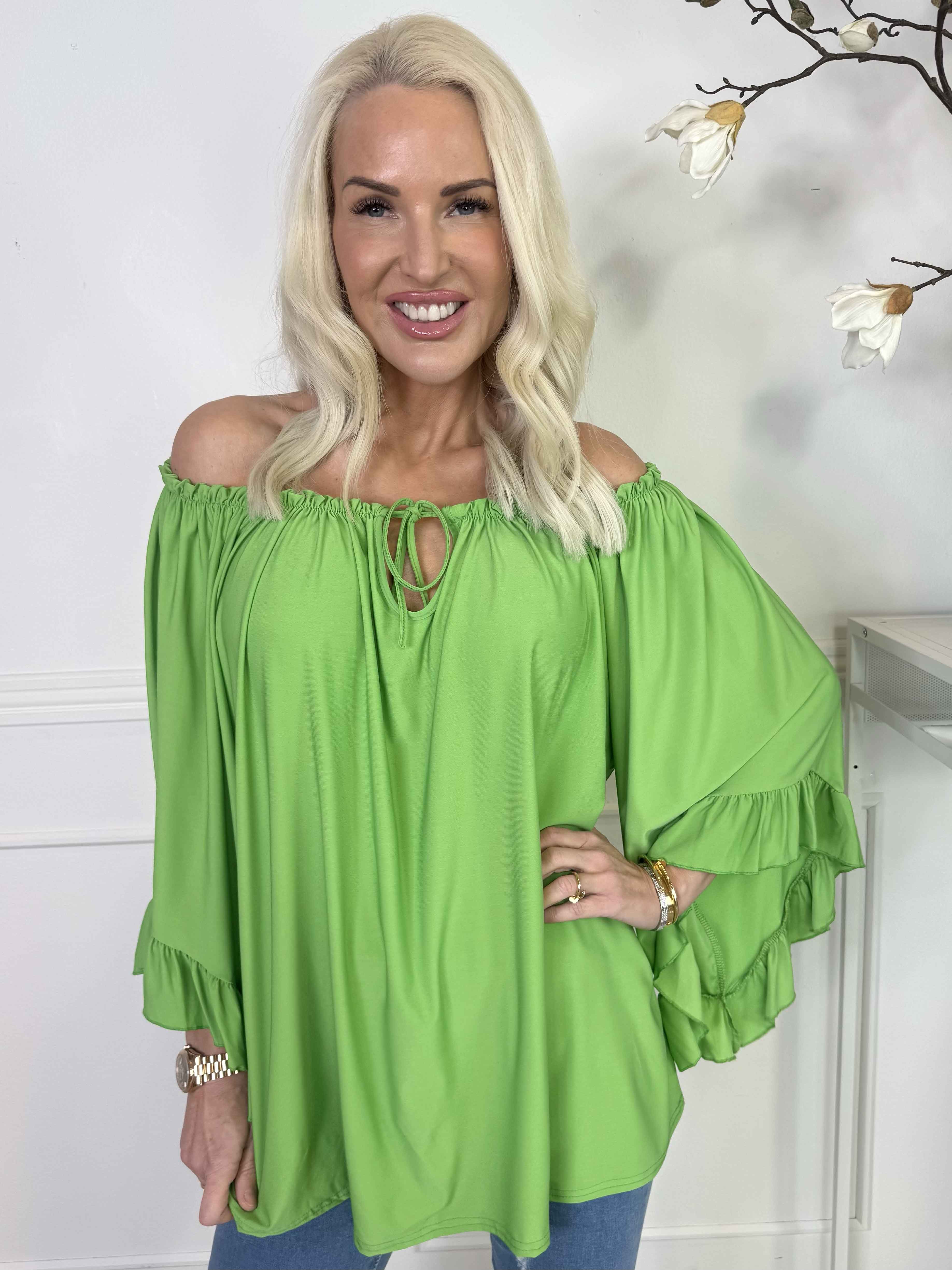 Anneli - Söt elastisk tunika med volangärmar